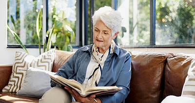 Buy stock photo Old woman, reading and book on couch in home with smile for story, novel and relax in living room. Elderly person, happy and break on sofa with literature, info or chapter at house in retirement
