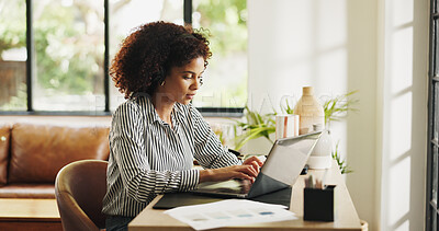 Buy stock photo Home office, laptop and woman with headphones, online and editing article on web, reporter and creative. Streaming, music and person with technology for project, typing and editor with story in house