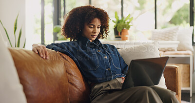 Buy stock photo Laptop, remote work and black woman on sofa in home for editing, story review and feedback. Freelance, hybrid worker and person on couch with computer for digital submission, copywriting and planning