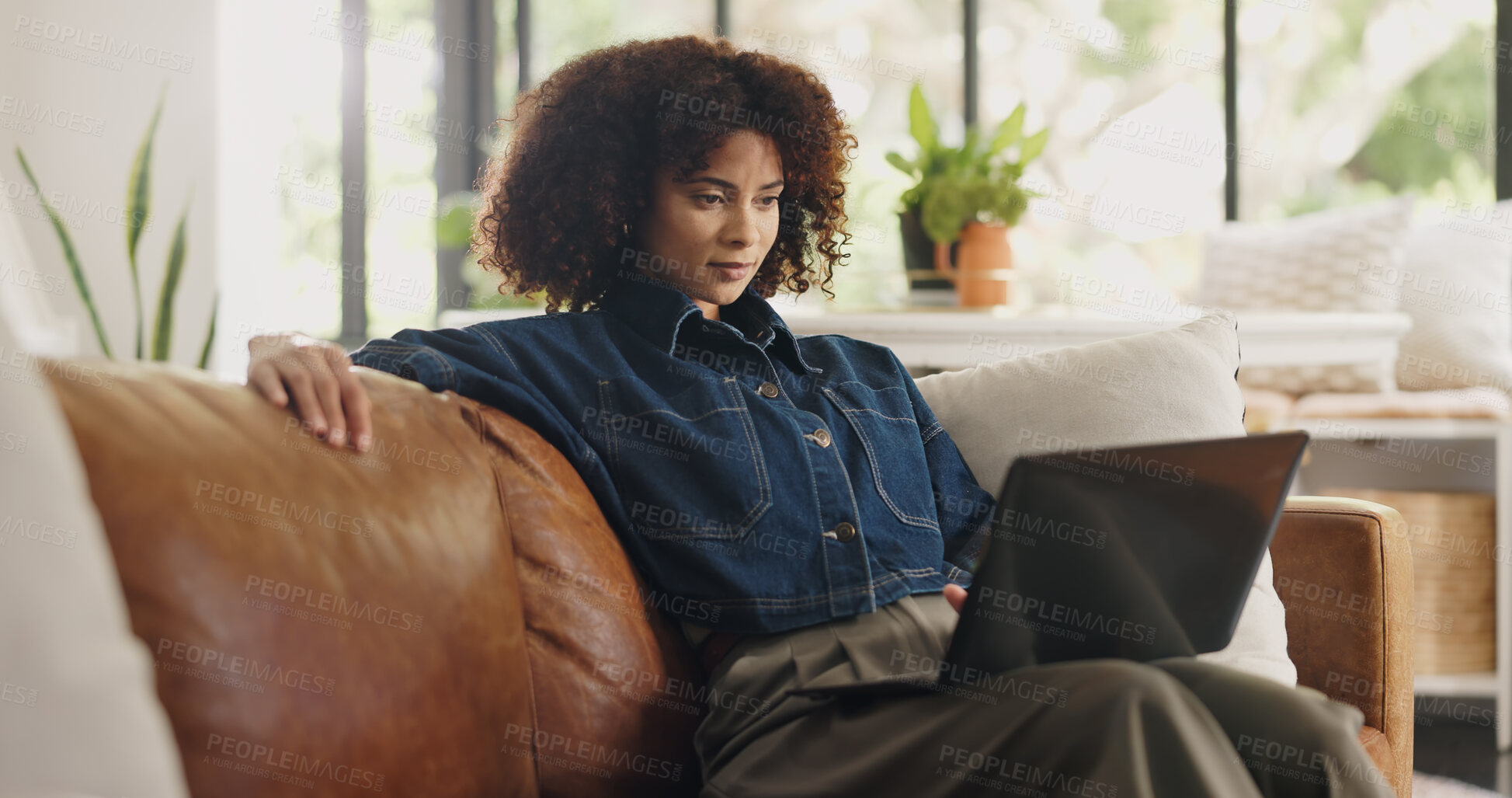 Buy stock photo Laptop, home and black woman on sofa for online editing, story review and freelance career. House, remote worker and person on couch with computer for digital submission, copywriting and planning