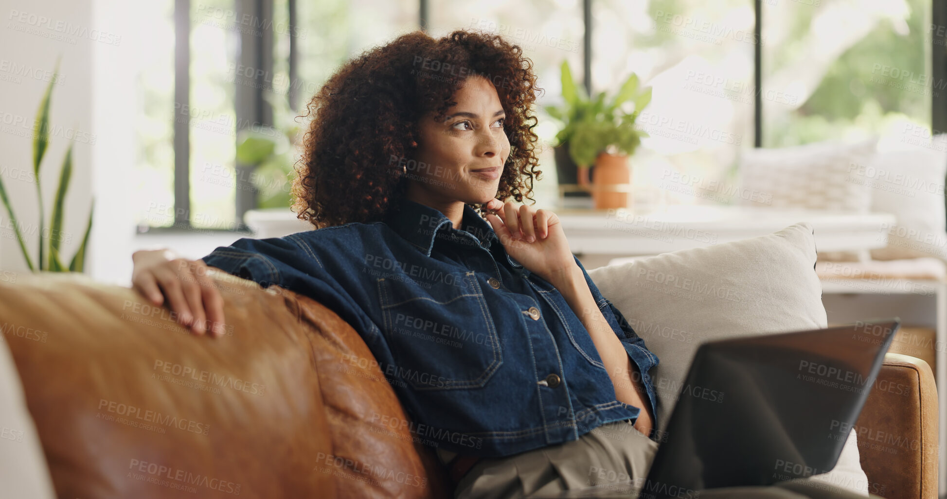 Buy stock photo Laptop, thinking and black woman on sofa for remote work, story review and feedback for editing. Home, hybrid worker and person on couch with computer for digital submission, copywriting and planning