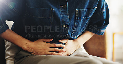 Buy stock photo Person, hands and stomach ache with indigestion for diarrhea, constipation or period cramps in home. Sore belly, tummy or gastrointestinal reflux with menstruation cycle for virus or pain in house