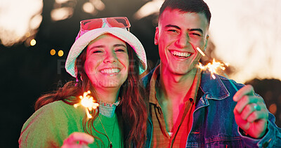 Buy stock photo Portrait, couple and laugh with sparkler outdoor for fun weekend, celebration and festival event. Happy, people or fireworks for rave culture, social gathering and bonding together at new years party