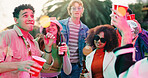 Dance, drink and party with friends outdoor together for bonding, celebration or social gathering. Alcohol, fun and reunion with group of people in backyard of home for energy, holiday or weekend