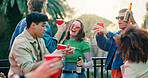 Dance, drink and party with people outdoor together for bonding, celebration or social gathering. Alcohol, fun and reunion with group of friends in backyard of home for energy, holiday or weekend