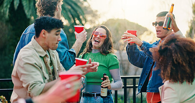 Buy stock photo Dance, drink and party with people outdoor together for bonding, celebration or social gathering. Alcohol, fun and reunion with group of friends in backyard of home for energy, holiday or weekend
