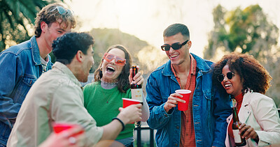 Buy stock photo Dance, drink and funny with friends outdoor together for celebration, party or social gathering. Alcohol, laughing and reunion with group of people in backyard of home for energy, holiday or weekend