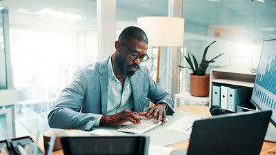 Buy stock photo Black man, typing and computer with charts at office for review, report and glasses at investment company. Person, broker or financial advisor with pc for graphs, statistics and admin at agency