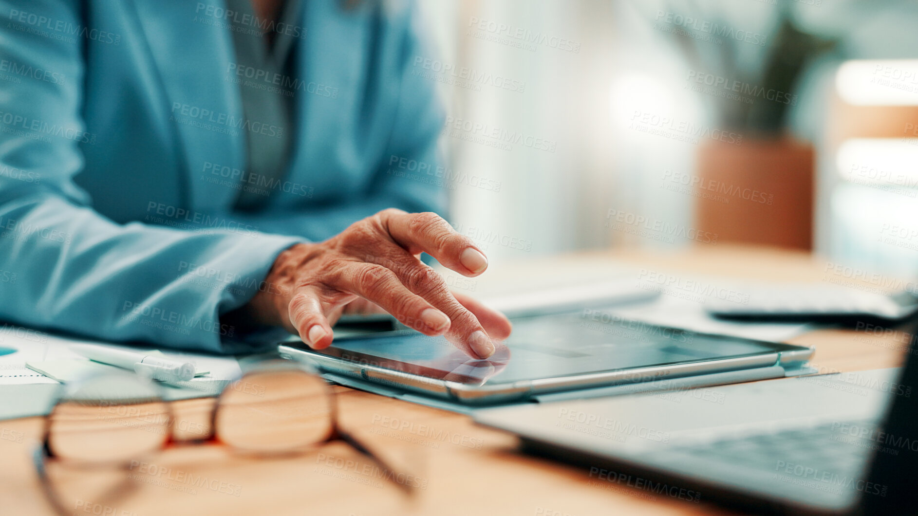 Buy stock photo Business, tablet and hands of woman at desk for research, investment and online website for report. Corporate, mature and person on digital tech for financial review, budget planning and proposal