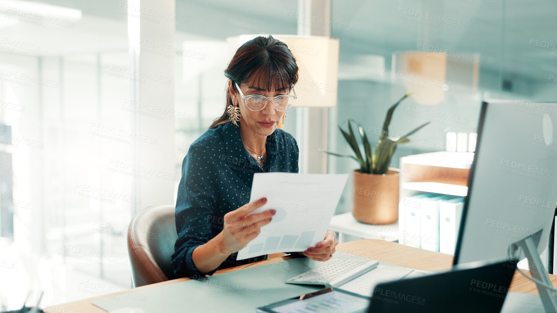 Buy stock photo Investor, reading and woman in office, documents for economy stats and profit growth for company. Mature person, financial advisor and paperwork for trading charts and report for investment audit
