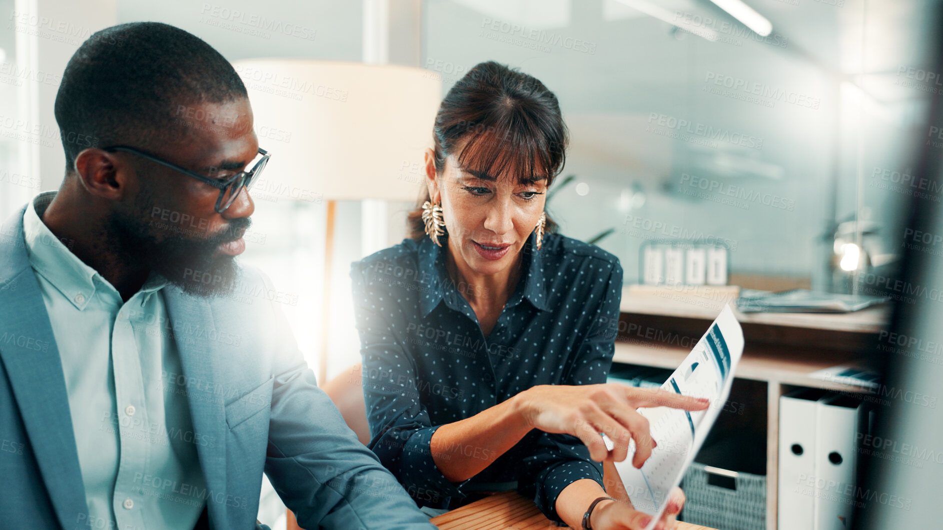 Buy stock photo Advice, meeting and business people in office with document, finance or investment for project. Problem solving, discussion and financial manager with employee for career development and help