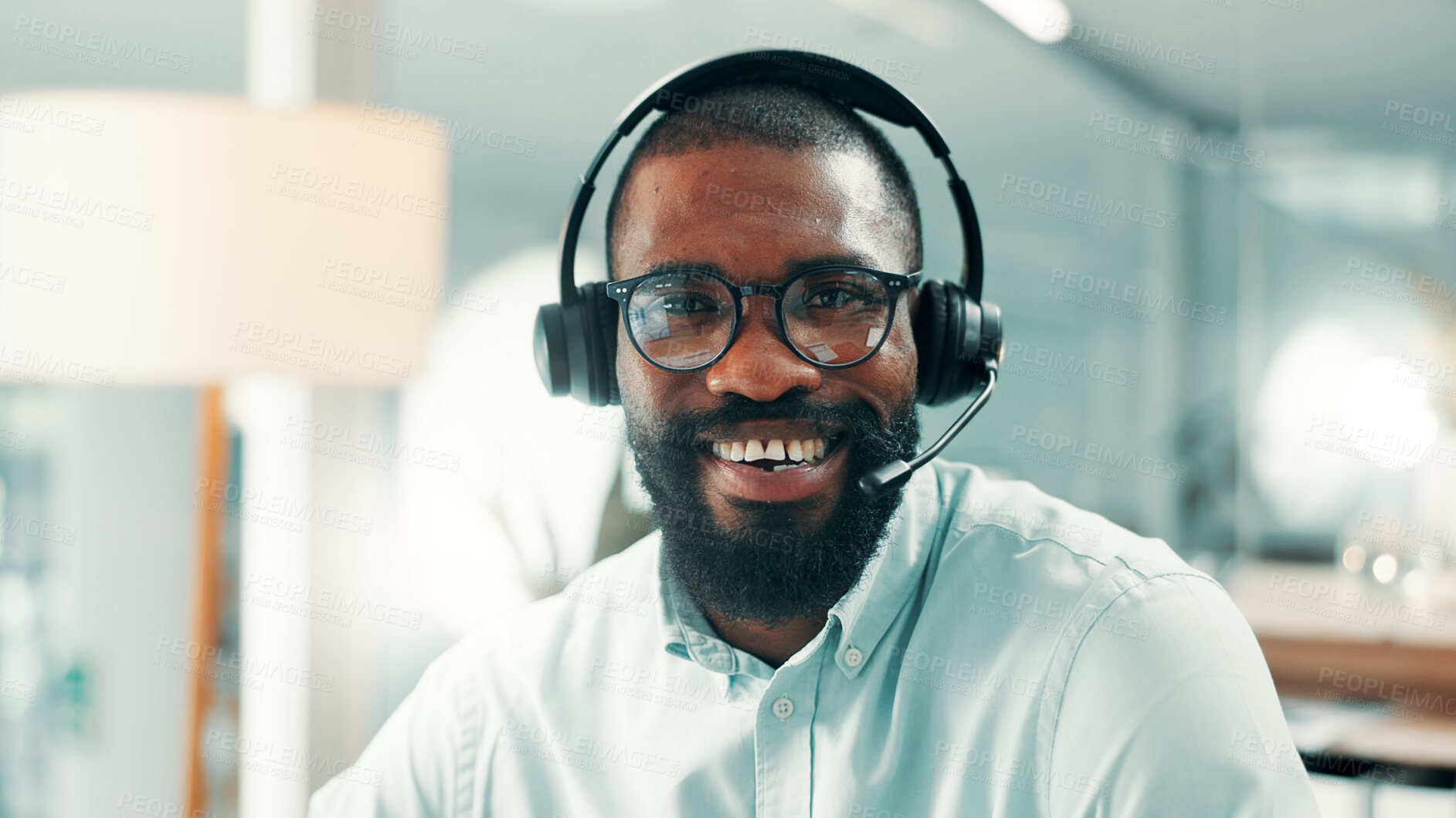 Buy stock photo Black man, portrait or consultant with headset in office for customer service or virtual assistance. Businessman, friendly agent or smile with mic for communication, help or support in call center