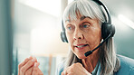 Mature, woman and consultant with headset for customer service or virtual assistance in call center. Female person, agent or talking with mic for web support, online help or communication in office