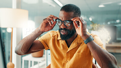 Buy stock photo Eye strain, glasses and reading with designer black man in office for problem solving or stress. Business, computer and eyewear with African employee in design workplace for error, mistake or vision
