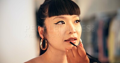 Buy stock photo Getting ready, makeup and stylist with model in studio for behind the scenes photography. Cosmetic artist, lipstick and preparation with woman on set of photoshoot for film or media production