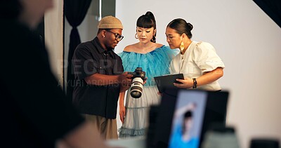 Buy stock photo Laptop screen, photoshoot and people in studio, camera and selection for magazine catalog. Group, man and women in workplace, collaboration and equipment for visual art project and production process