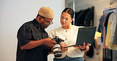 Buy stock photo Creative, people and photographer in studio with laptop, camera or partnership for media project review. Photography, team and collaboration on set with film production, computer and idea discussion.