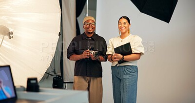 Buy stock photo Portrait, photographer or creative people in studio with camera, clipboard or partnership for project. Happy, photography team or collaboration on set with film production, equipment or media agency.