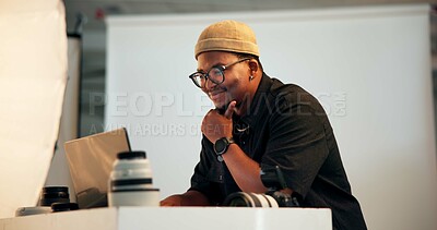 Buy stock photo Photographer, thinking or man with laptop in studio for catalog results, editing or planning. Cameraman, black person or creative idea with tech BTS for photo review, retouch image or post production