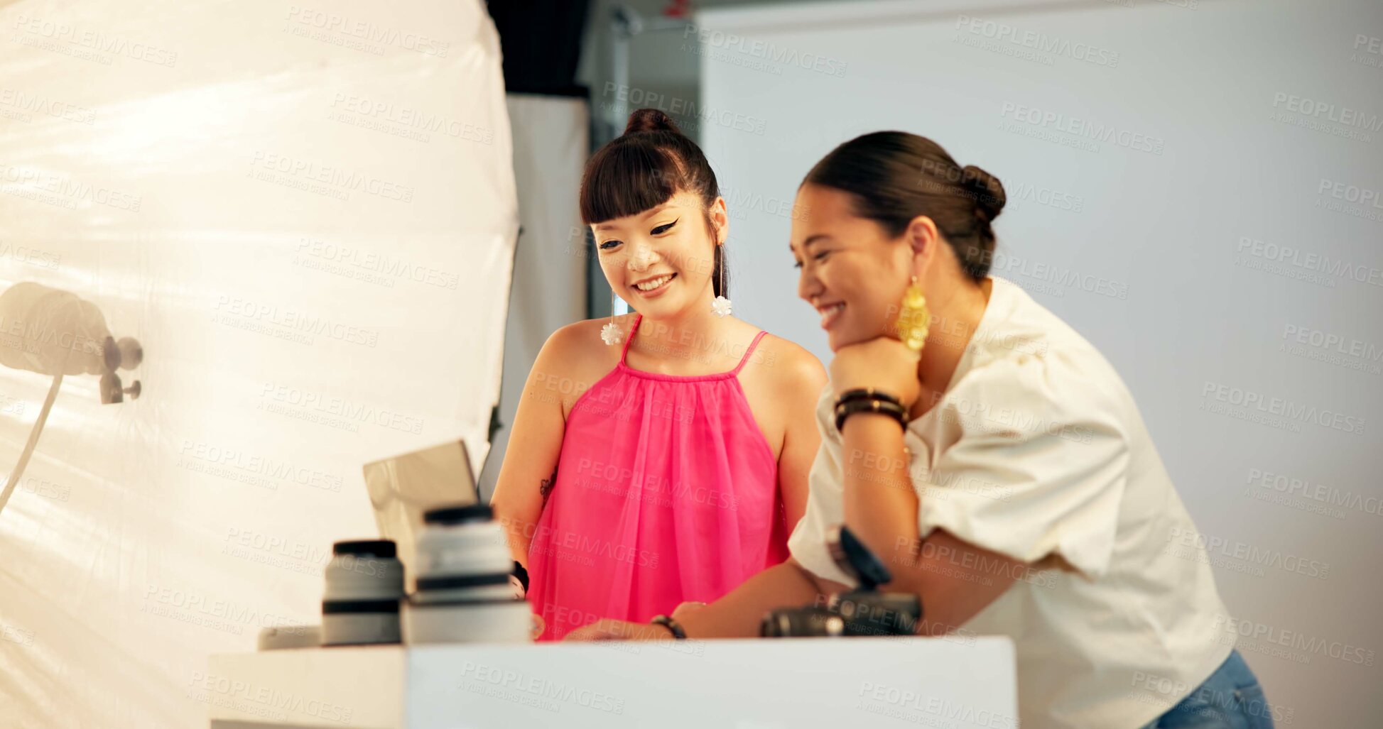 Buy stock photo Photographer, model or laptop with results in studio for fashion catalog, image review or retouching. Photography, women and happy with tech for editing photoshoot, picture quality and check lookbook