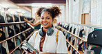 Woman, college student and smile with books at library for research project, studying and confident at campus. Girl, happy and learning with literature, portrait or pride for education at university