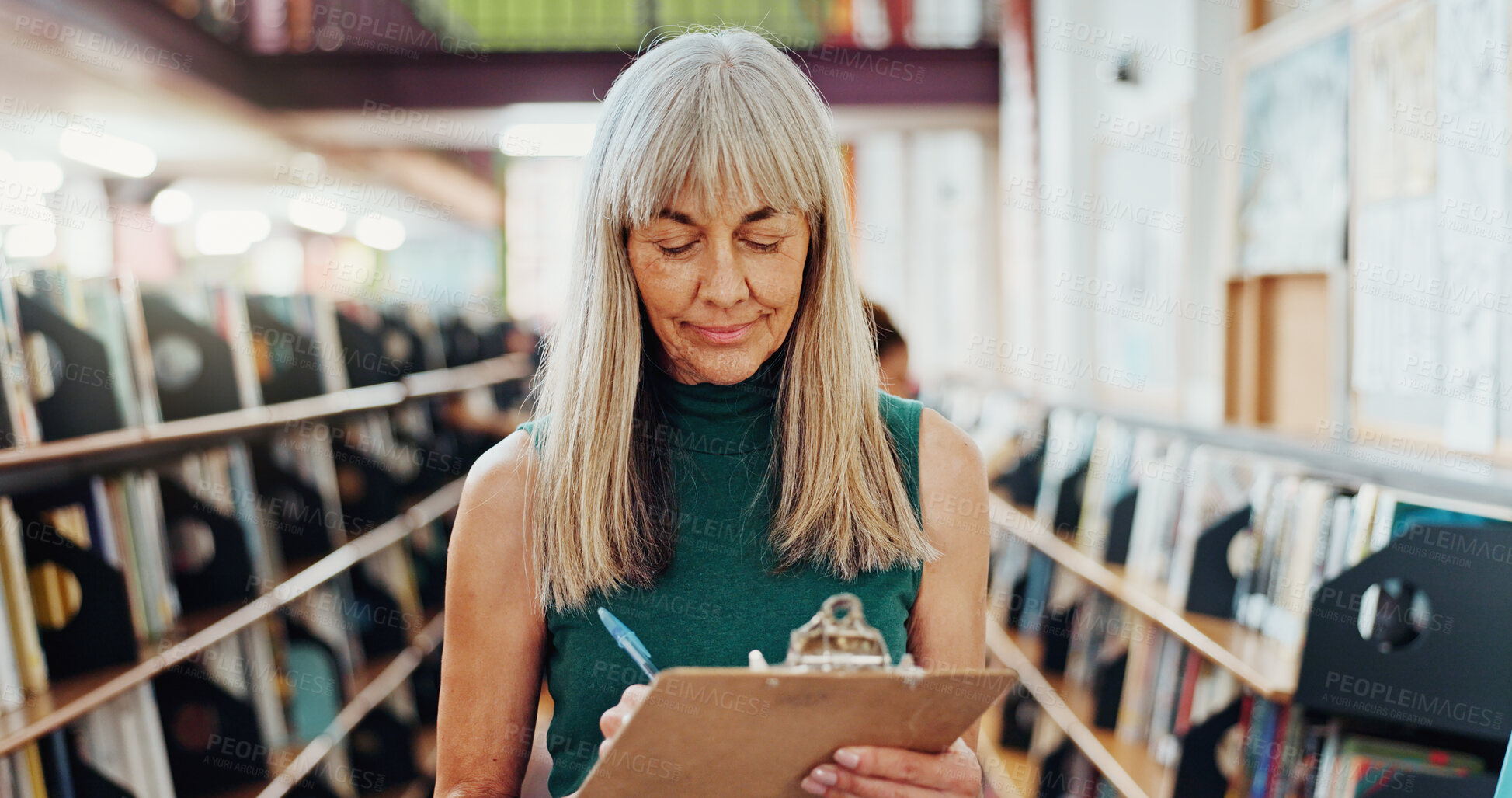 Buy stock photo Library, writing and mature woman with inspection for stock control, material checklist and info. Admin, librarian and clipboard in bookstore for inventory notes, sampling books and resource catalog
