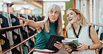 Women, college student and librarian for discussion for search, guide or point for books at campus. People, smile and girl with tech, application and scholarship with help for university education