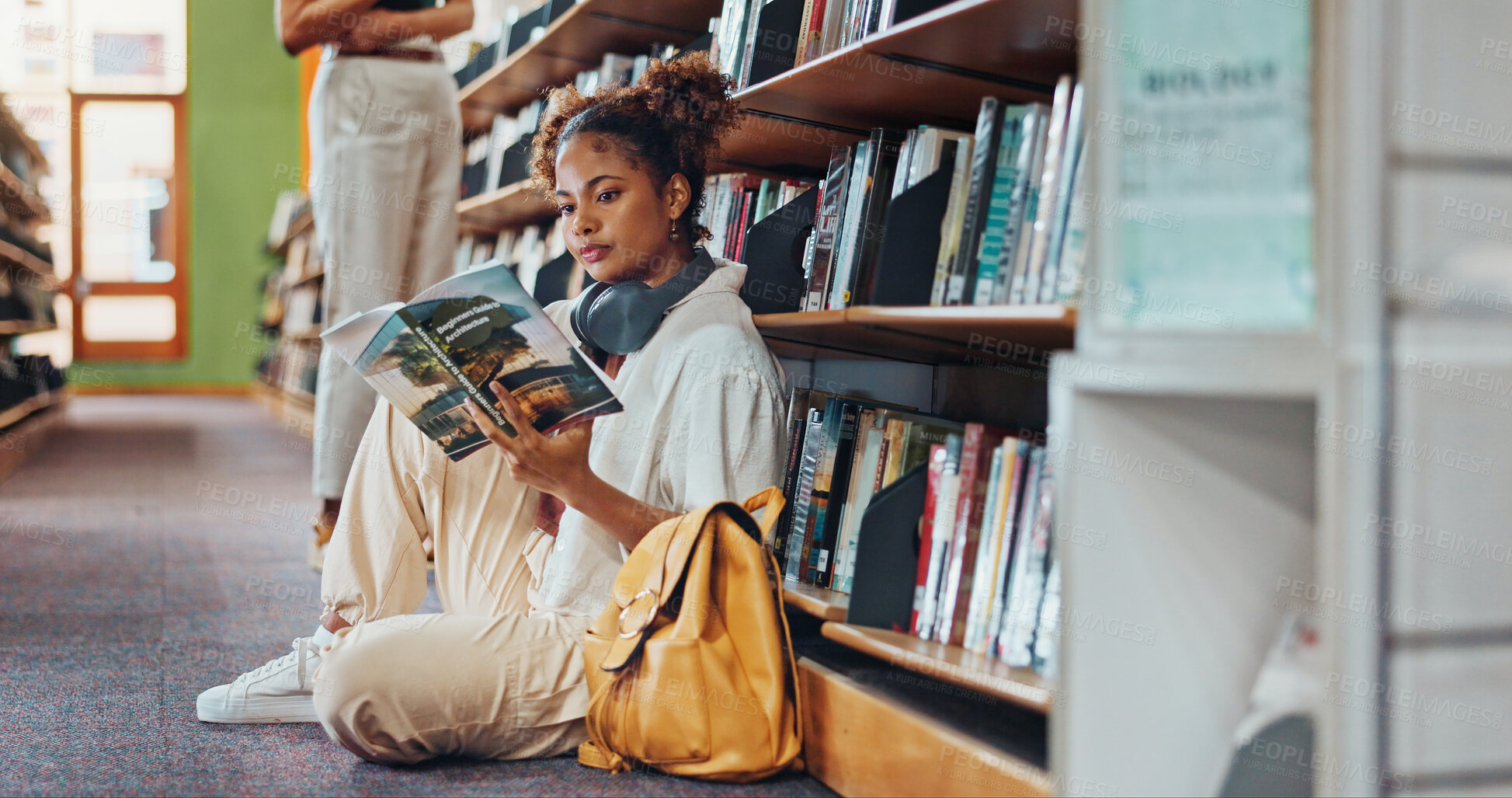 Buy stock photo Student, girl or reading book at campus library for architecture course, info search or learning. College, person and design planning textbook on floor for exam preparation, knowledge and scholarship
