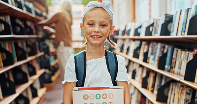 Buy stock photo Education, portrait and smile of girl in library for child development, literature or study. Books, learning and reading assignment with happy student at school for future, information or knowledge