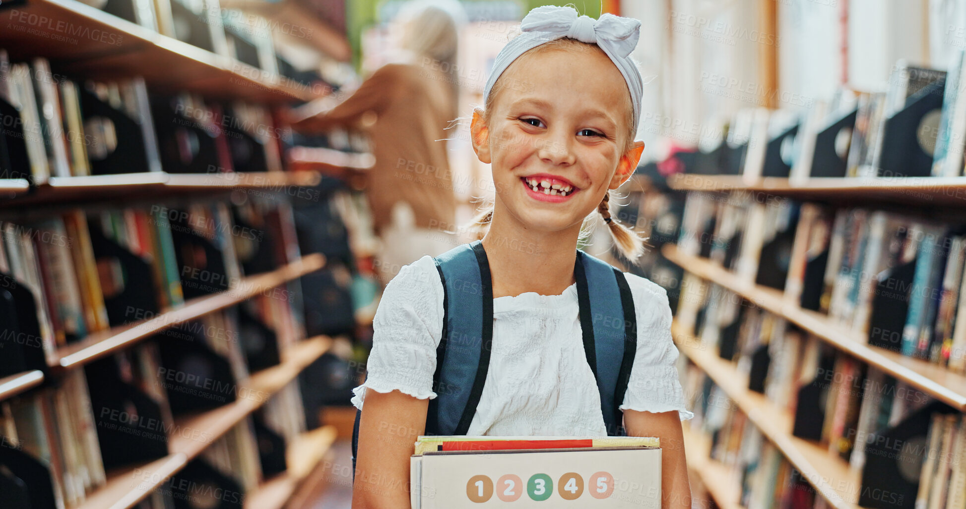 Buy stock photo Learning, portrait and smile of girl in library for child development, literature or study. Books, education and reading assignment with happy student at school for future, information or knowledge