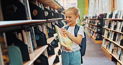 Buy stock photo Smile, child and girl with book in library, language skills and vocabulary development for education. Literacy knowledge, fairy tale story and kid with literature for reading, academic growth or info