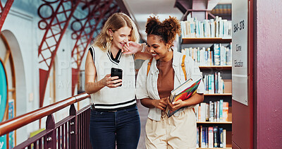 Buy stock photo Laughing, friends and women with smartphone, library or gossip on social media, education and online. University, students and people with mobile for funny post, together and happiness with books