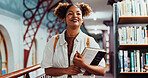 Woman, college student and happy with books at library for reflection, thinking or education at campus. African person, smile and perspective for scholarship, literature and inspiration at university