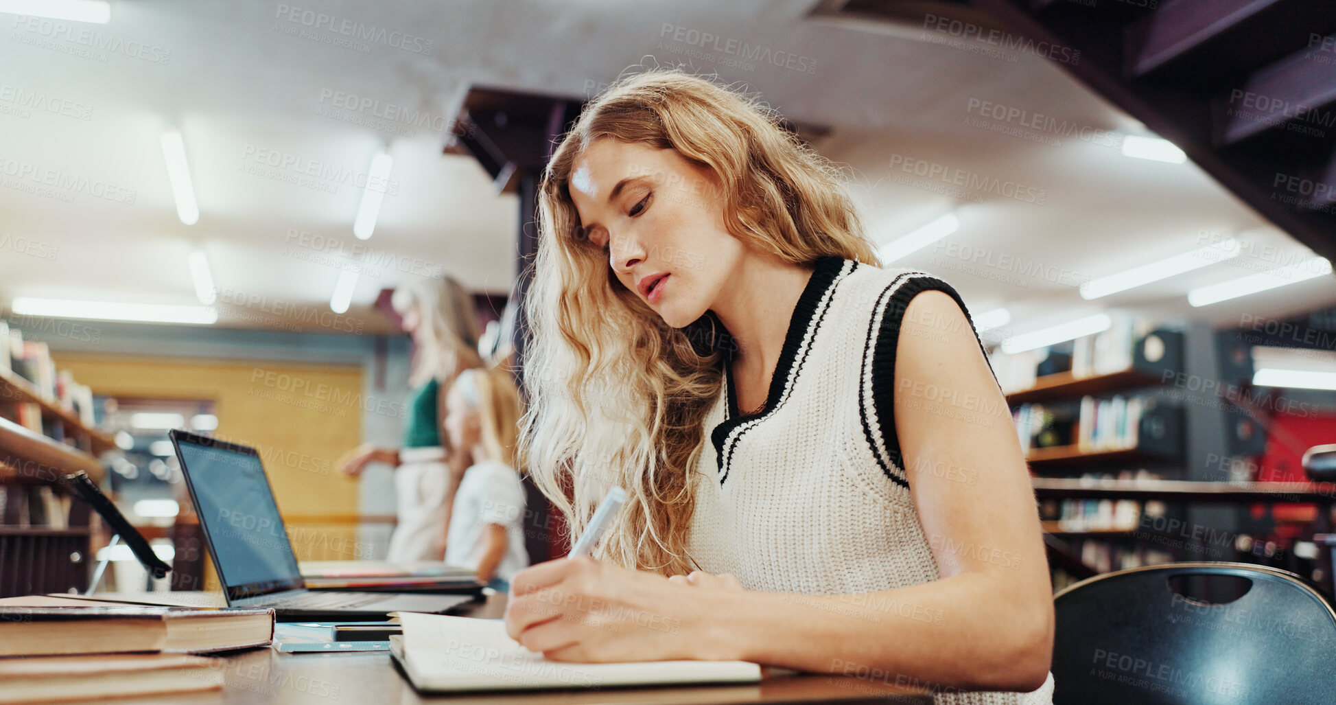 Buy stock photo Woman, student and writing with book in library for studying, education or learning in school. Female person, university or taking notes with diary or notebook for project research or assessment