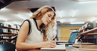 Buy stock photo Woman, student and studying with book in library for education or learning in school. Female person, writing or taking notes with diary or notebook for project research, assessment or test on campus