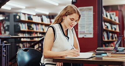 Buy stock photo Happy woman, student or writing with book for education, knowledge or learning in school library. Female person, studying or taking notes with diary for project research or assessment on campus