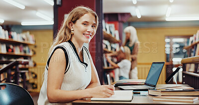 Buy stock photo Happy, notebook and portrait of woman in library for studying with university exam, test or assignment. Smile, laptop and female student with research for learning at college campus for assessment.
