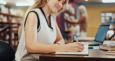 Buy stock photo Woman, student or writing with book for education, knowledge or learning in school library. Female person, studying or taking notes with diary for project research, essay or assessment on campus