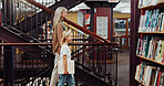 Teacher, child and walking in library with book, numbers system education and learning for math skills. Counting story, smile and woman with girl for knowledge growth, study support and tutor session