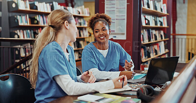 Buy stock photo Women, medical students and talk with laptop at library for research, smile and brainstorming at campus. Girl, healthcare scholarship and computer with insight, discussion and listen at university
