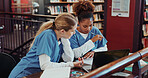 Women, medical students and discussion with laptop at library for research, education and feedback at campus. Girl, healthcare scholarship and computer with insight, planning and notes at university