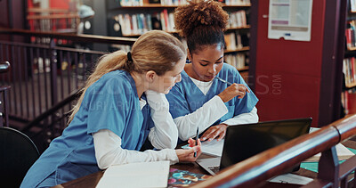 Buy stock photo Women, medical students and discussion with laptop at library for research, education and feedback at campus. Girl, healthcare scholarship and computer with insight, planning and notes at university