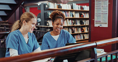 Buy stock photo Women, medical students and review with laptop at library for research, planning and education at campus. Girl, healthcare scholarship and computer with insight, learning and smile at university