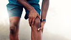 Man, hands and fitness with knee pain for workout accident, sprain or pressure in nature. Active, male person or runner with sore leg, joint inflammation or muscle tension for training injury in fog