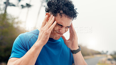 Buy stock photo Athlete, fitness and man with headache outdoor from intense workout, dehydration or discomfort. Space, pain and runner with tension migraine in nature from mental fatigue, overworked and sore temples