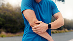 Fitness, hands or person with elbow pain outdoor for sports injury, workout mistake or discomfort. Athlete, ache or joint strain in nature with nerve compression, muscle tension and exercise fracture