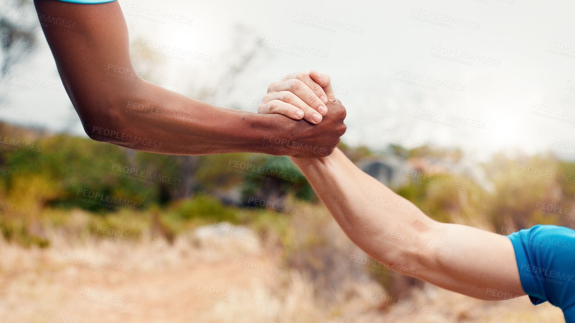 Buy stock photo Help, runner and team with hands of men outdoor for workout partner, fitness and support together. Exercise club, assistance and training aide with friends in nature for sports, synergy and health
