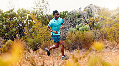 Buy stock photo Trail, runner and fitness with black man in nature for workout, performance and cardio challenge. Exercise routine, wellness and training with person outdoor for running practice, sports and stamina