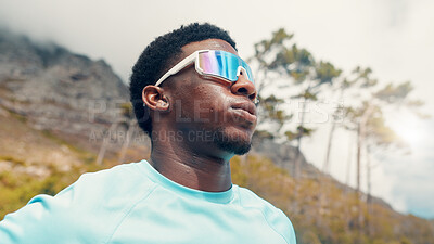 Buy stock photo Thinking, nature and black man with exercise, sunglasses for uv protection and challenge. Decision, reflection and person with eyewear, polarized lenses and fitness for health benefits and low angle