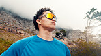 Thinking, outdoor or man with workout, sunglasses for uv protection or polarized lenses. Nature, reflection or person with shield eyewear, low angle or exercise for health benefits, safety or fitness
